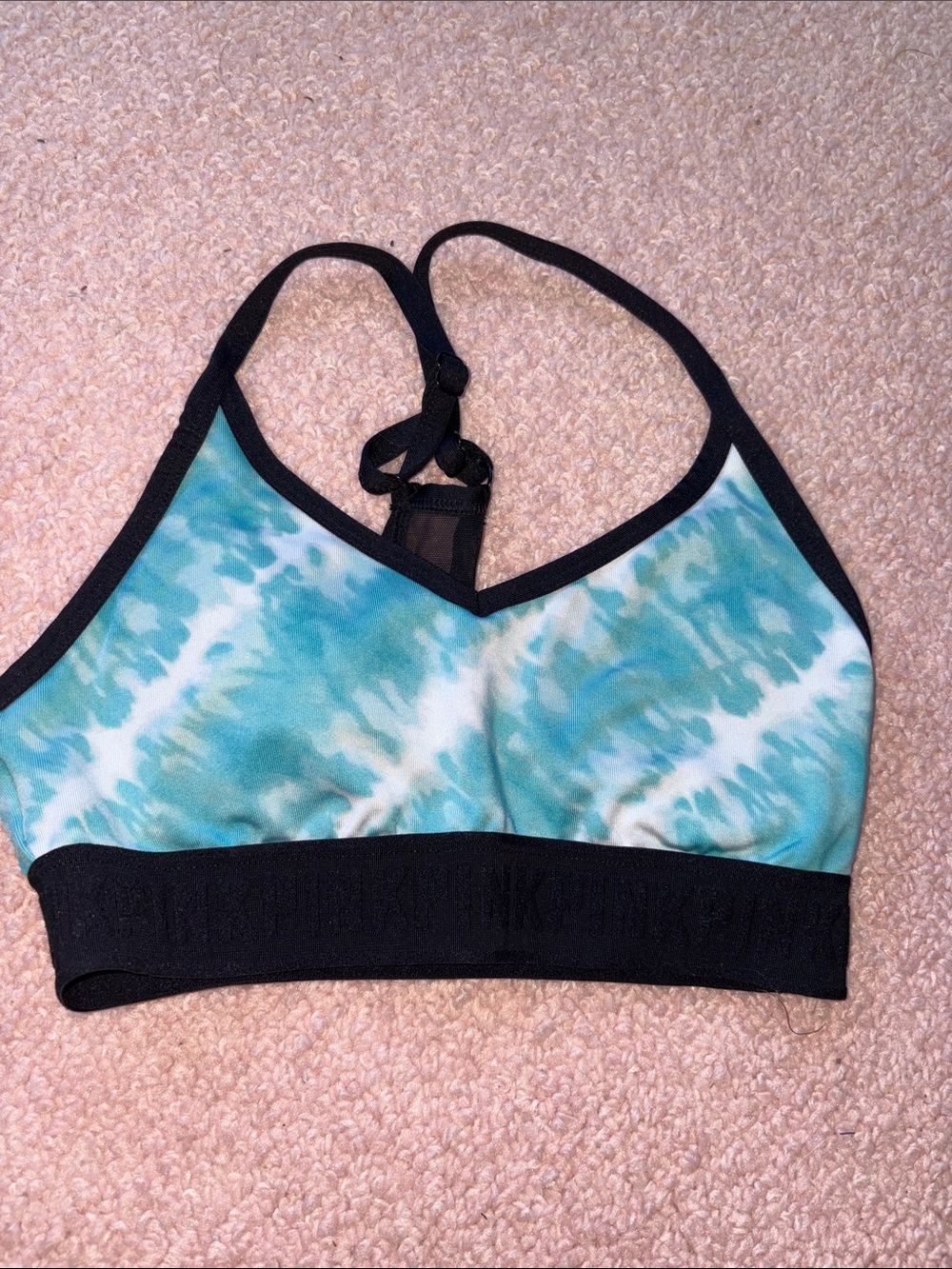 Pink sports bra with removable pads